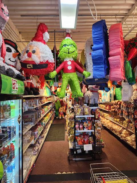 Store aisle with piñatas